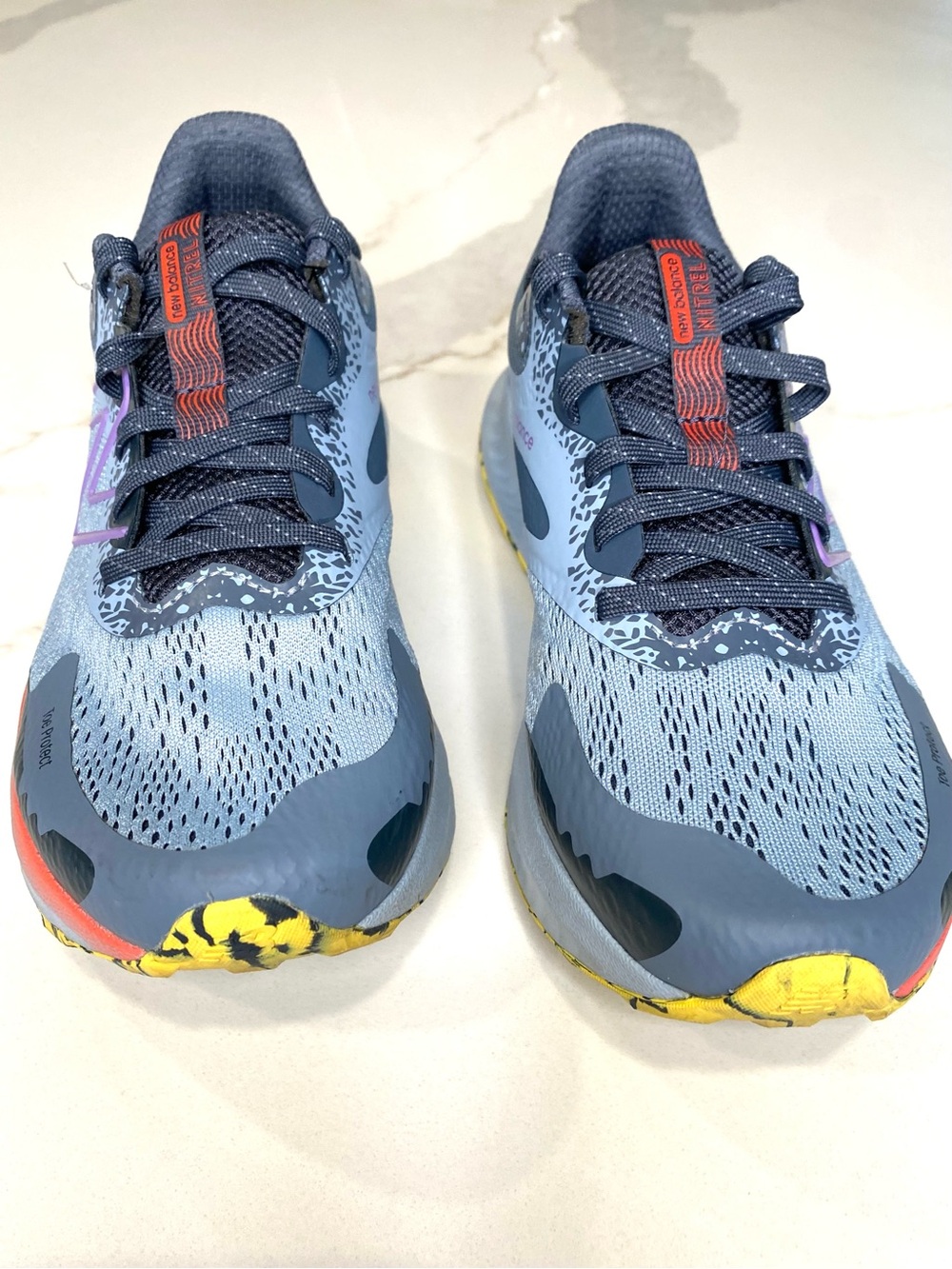 New Balance Light Blue and Navy Athletic Sneaker